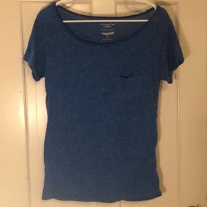Blue scoop neck top.